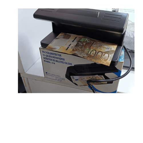 Counterfeit money detector 